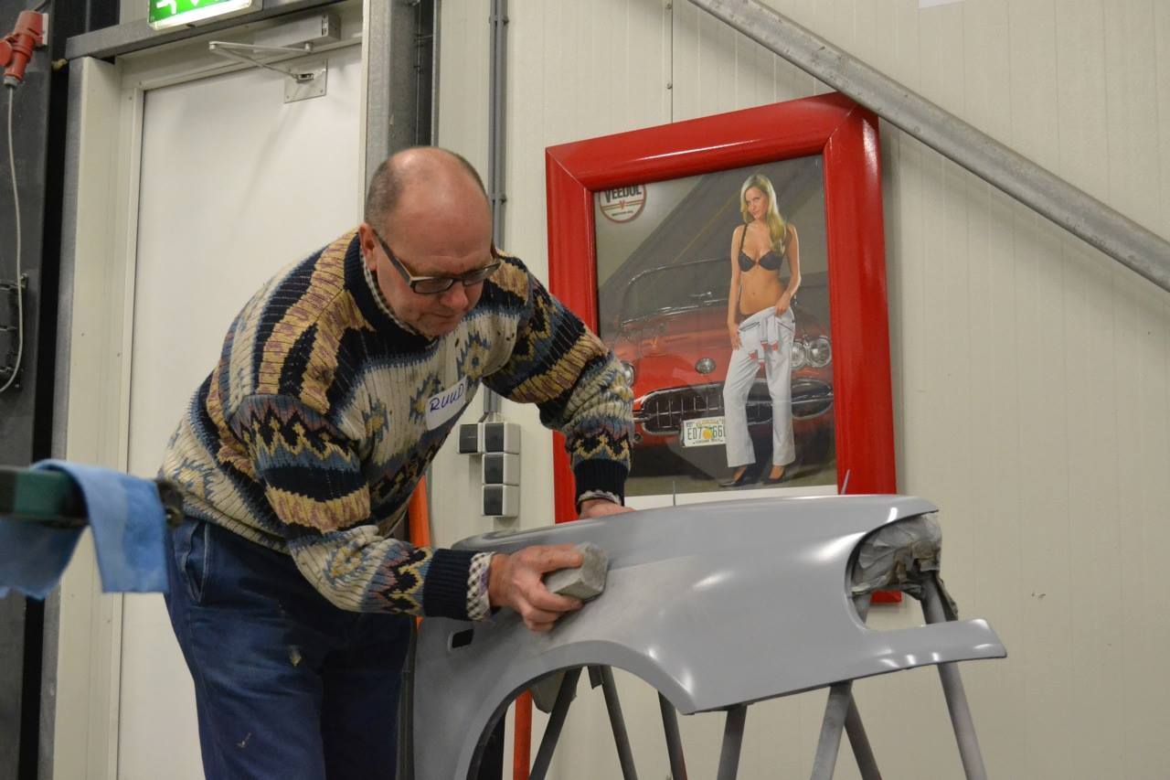 let op de achtergrond garage kunst.jpg